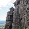 Floyd Hayes leading at the wild step across a chasm on New Tradition 5.8. Photo by an unknown climber.