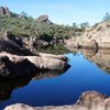 Blue sky, glassy water, at the reservoir