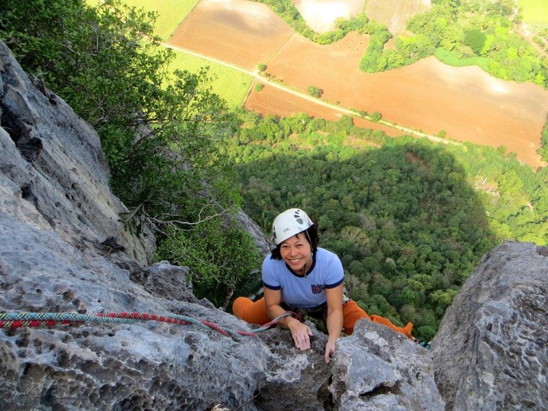 Pitch 5 of Corcovado - fun climbing on a beautiful limestone mountain.  Sunflower fields below are in (partial) bloom.  Jan. 2013.