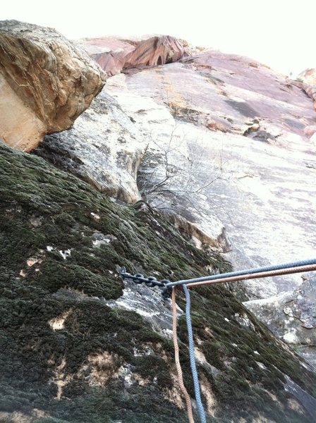 Rap location at the base of the route to avoid down climbing the mossy slab