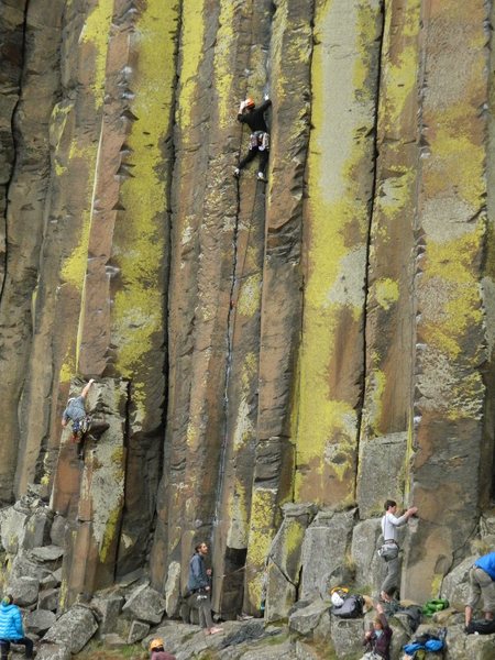 The crux of the climb is midway up when transitioning from the left crack to the right one, both technically and from protection perspective.  This route has abundant holds all around, not just the crack and so is too easy for the grade compared to others at the Coulee.<br>
I taped my hands though, so have a skewed perspective :)