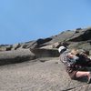 Leaving the belay ledge at the top of the second pitch and approaching the "awkward" roof.  The route continues up through the prominent right facing dihedral center left in the picture and the "finger of fate" can be seen just beyond and a tad to the left of the corner.