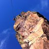 Nothing but air! Austin starting down on rappel. 