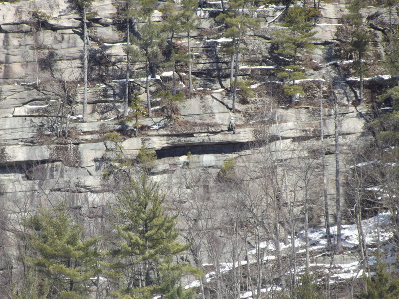 A climber just over the roof Coyote Rain