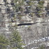 A climber just over the roof Coyote Rain