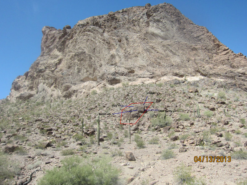 Looking up at the cluster from below. "Judge" is on a the next boulder uphill from "Not Guilty"