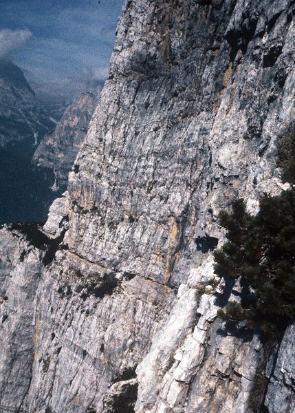 Looking across the face towards "Via Commune," from "Spigolo Jori." The small patch of yellow rock indicates approximate line taken.