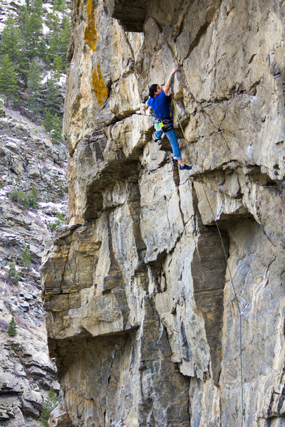 Juan climbing the juggy overhanging bottom section. 