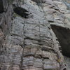 Section of the B-section (Guoliang Tunnel Wall) crag. This is possibly the most developed crag in the whole park, given its proximity to Guoliang. In this photo, a climber from the nearby city of Zhengzhou makes his way up a stout .11 near the newly bolted amphitheater.