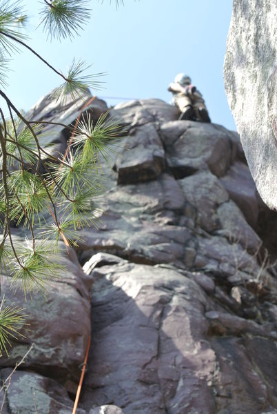 Steve Z. out of focus and past the cux of Mindless Dribble on 4-28-13. The first really nice warm and sunny weekend climbing day of Spring 2013.