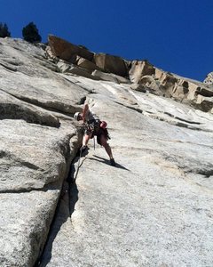 Climbing the first pitch of The Big Deal.  Right leaning , slabby crack climbing.