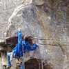 Nik working through the bulge/nose feature of Cape Point, 5.11-.