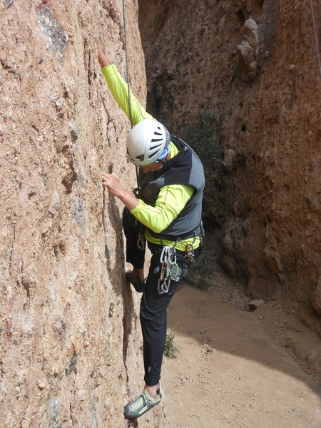 Climbing steep pockets and inclusions in the First Corridor.