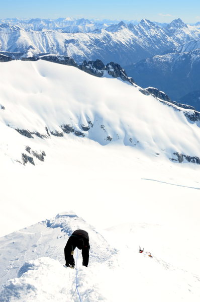 Looking down the summit ridge to our skis