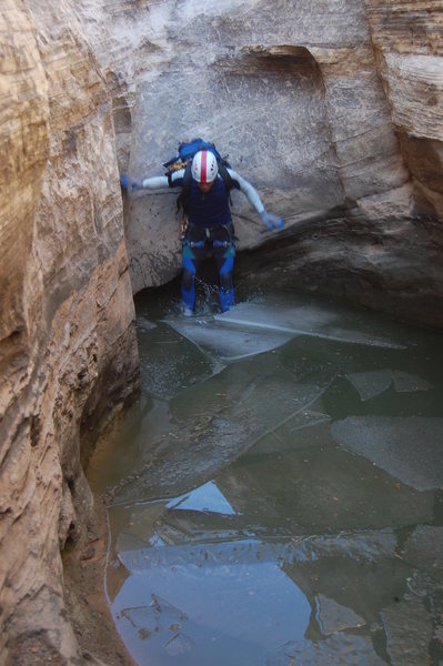 There's more to the Swell than climbing! Eddie sliding into the first pothole of "3 Fingers Canyon" on a chilly March descent. 