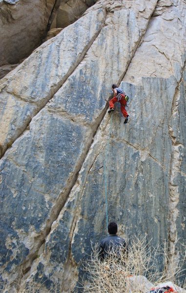 Jordi at the crux of Chronic, just before he fell. the flake at the right is loose.