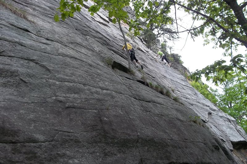 The first climber is on akidlleativytoowouldn'tyou?  The first rope lies on Far From the Madding Crowd.