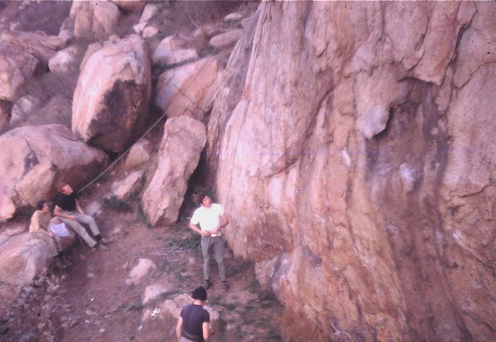 We din't need no stinking harnesses!  Mary Byron, me body belaying Paul Gleason as he ties in with a bowline on a coil, set to send what we called Cyclops (Eye). We're wearing Kronhofers, so must have been ca 1969-70. Phil Gleason photo.  