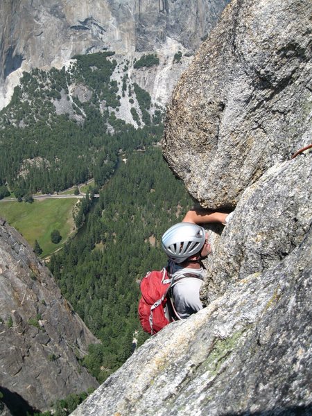 Pulling the last move on to the summit. 