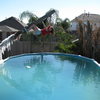 Leadon Meneke on a deep water solo in my back yard.  Note the hanging ice on the left side.