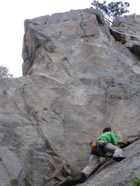 The approach slab toward Party Time. A small cam can be placed in the crack to the left en route to the first bolt.