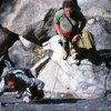 Eddie Bebout leading 5.10 slab, John Stannard - hip belay c.1988. The place that cannot be mentioned (it's seekrit!) B.C. Mexico.