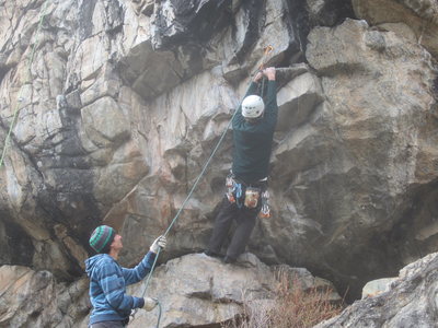 Clint halfway through the crux start of Standing Eight Count.