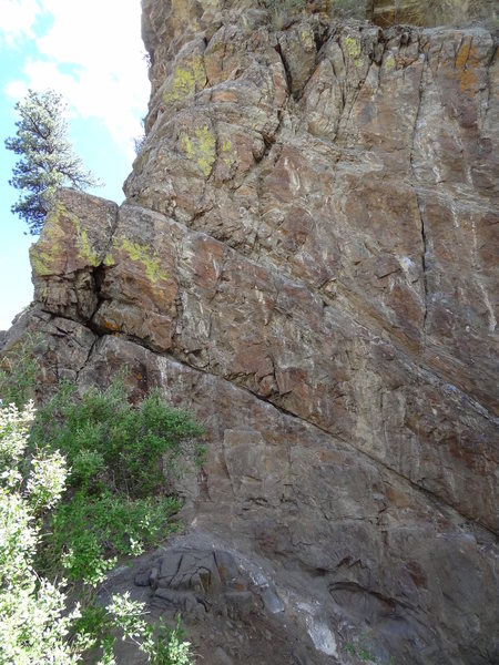 Rock the Vote is the right bolt line. Both this and Independence Day end at the ledge in the top of this photo beneath the small bush.