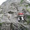 Marin starting up Bachvata (5.8) on the most obvious buttress (called "The Butt") in the canyon. This route is 50 meters high and has a rappel anchor on top.