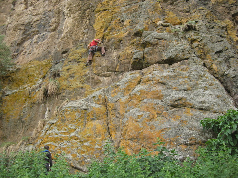 The climb starts below the climber in the obvious finger crack. 