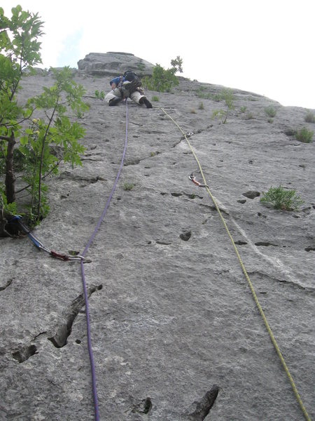 Marin on the crux 2nd pitch of the route February on the Tooth.