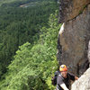 Christopher Lane reaching the belay on Pitch 2