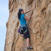 Lena works up to the final crux on Mighty Quinn (10c)