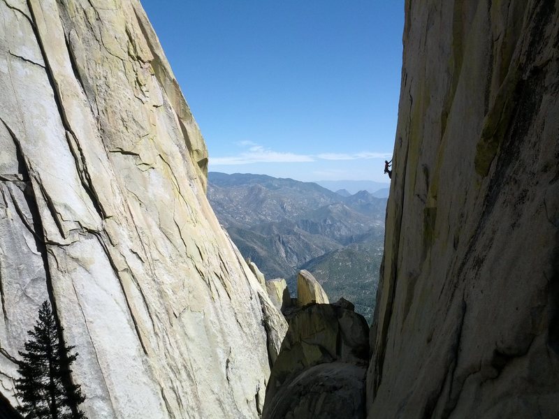 A climber on Thin Ice on The Sorcerer. Needles, Southern Sierra.