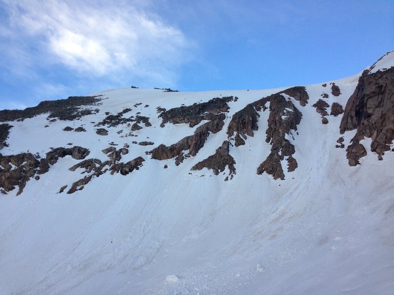 Started at the apron at 6 am 6-14-13. Snow not totally solid around one rock in the steepest section, perhaps someone with longer arms could reach up to plunge an axe all the way. Also some melting occurring requiring a zig zag. I would start it earlier if I did it again. Desdemona has a good-sized cornice on top. 