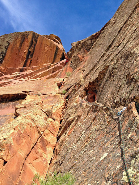 A view from the pitch 2 belay. Lucas is in red and in the thick of it!