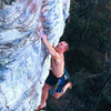 Seth Tart barely salvaging a foot slip in mid crux<br>
Photo By Chris Huffine