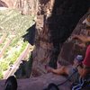 Dan points out the finer aspects of Zion climbing from the summit of Ashtar Command Tower. 