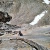 Matt sizes up the dead point on the crux pitch.