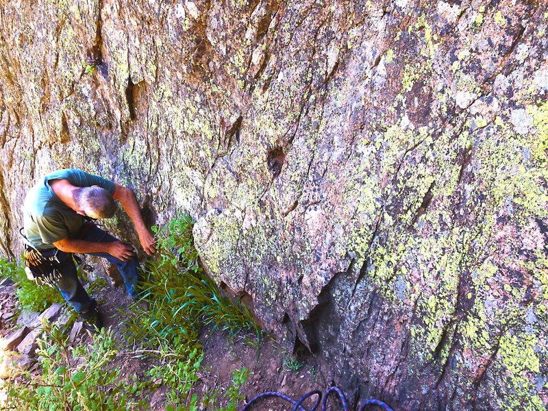 Taking a knee, catching his breath on a hot day.