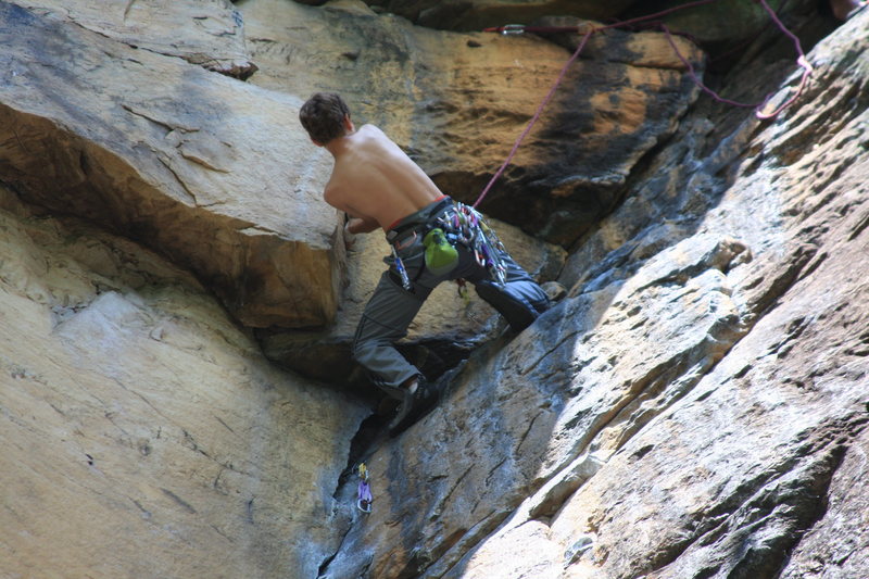 Matt climbing through the fun layback finish.