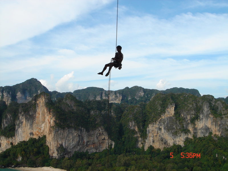 rapping off with a line fixed in the "belay cave"