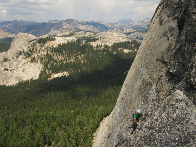 Just after pulling over the roof on pitch 4.