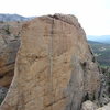 Climbing Slabbed Up-Side da Head with a view of the whole Fin and the valley behind.