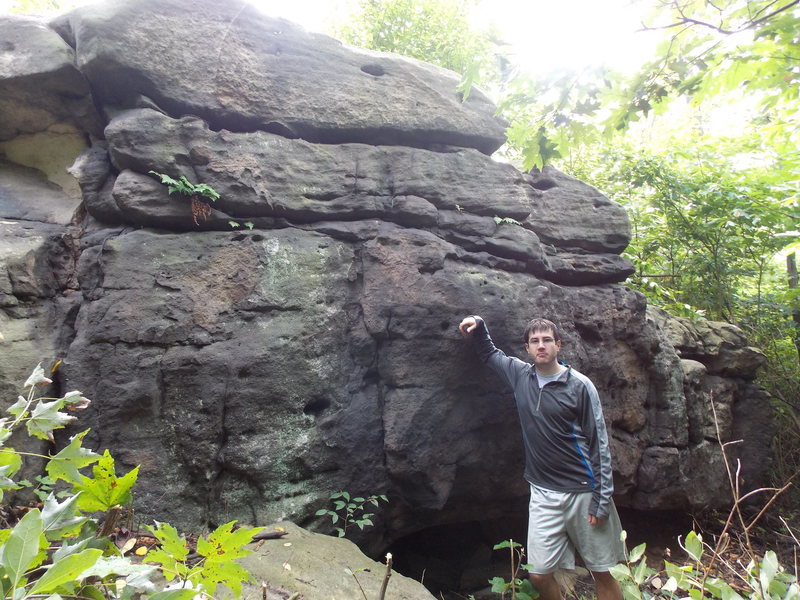 Fairly large Gritstone in the woods out side of South Fork, PA.  Not very high but long