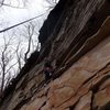 Highest part of the wall at Flood Rocks.  Interesting mixed layer rock.  Bottom, reddish sandstone, middle maybe some kind of limestone mix?, top Gritstone.<br>
Not sure how high it is would guess 35-40'.  