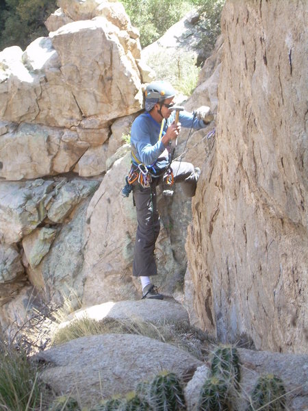 Jeff M. fixing up the rap anchor on the back. Single rope 70m. rap gets you down from here in style!