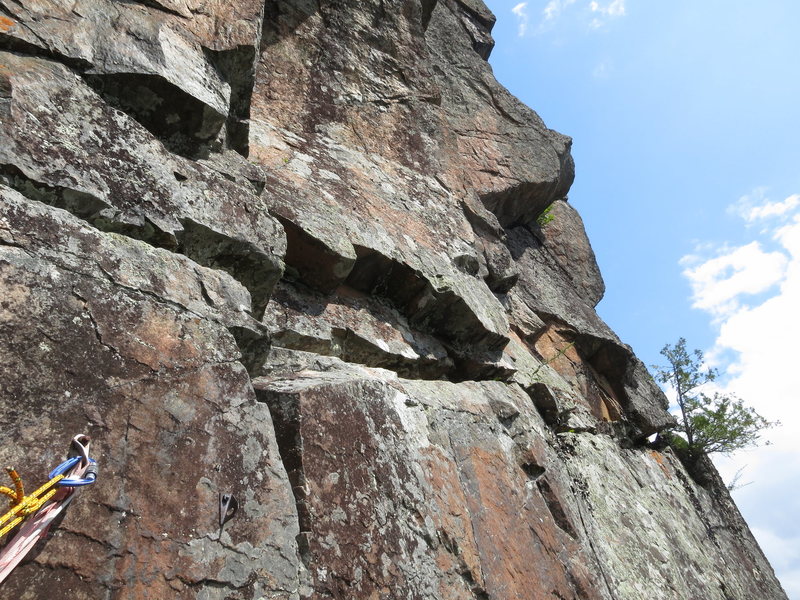 Pitch 2<br>
Traverse along the horizontal under the small overlap until the overlap runs out. Then pull up into a small alcove (careful here, loose rock).