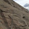 The rating of this route is not indicative of the difficulties. When the climbing tips into the 5.10 range it is protected with a bolt but the true challenges of this climb are keeping it together on 5.8 wandering slab way out over a bolt. 