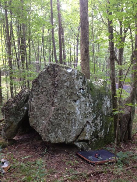 Pad is located directly under Effie problem with Henry being uphill.  Note road visible in background.  This boulder approach is quick!